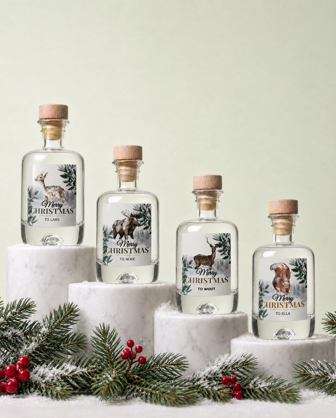 Set van vier gepersonaliseerde gin mini flesjes met kerstetiketten als kerstcadeau