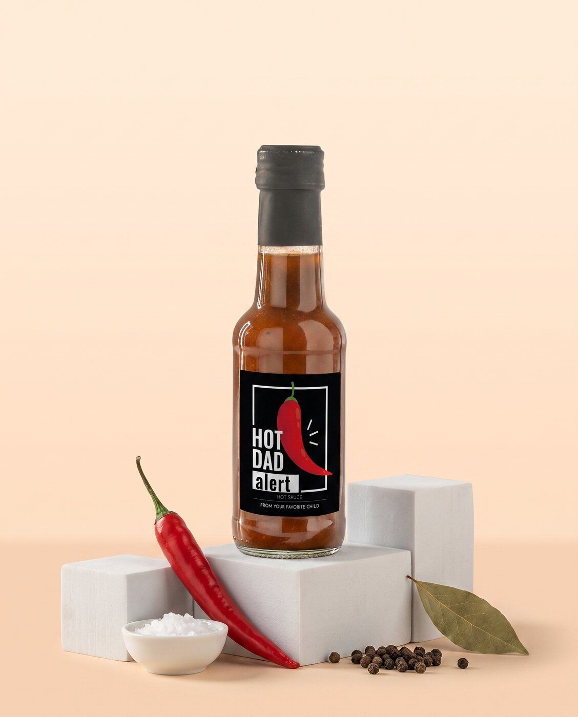 Personalised hot sauce bottle with a Hot Dad Alert label