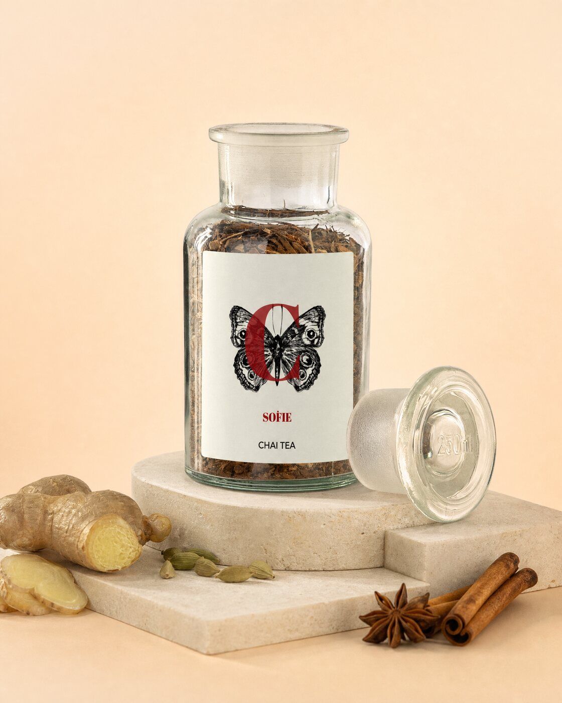 Personalised chai tea jar with a butterfly monogram label